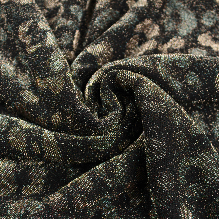 Tissu jersey noir motifs géométriques bronze et argent brillant et extensible
