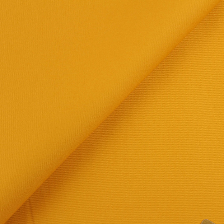 Tissu gabardine coton/polyester jaune moutarde uni