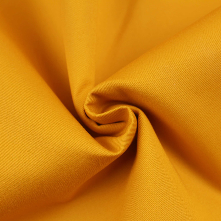 Tissu gabardine coton/polyester jaune moutarde uni