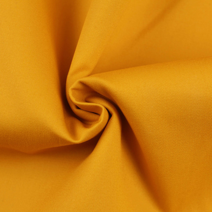 Tissu gabardine coton/polyester jaune moutarde uni