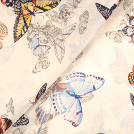 Tissu crème imprimé papillons rouge, bleu et jaune | Moline