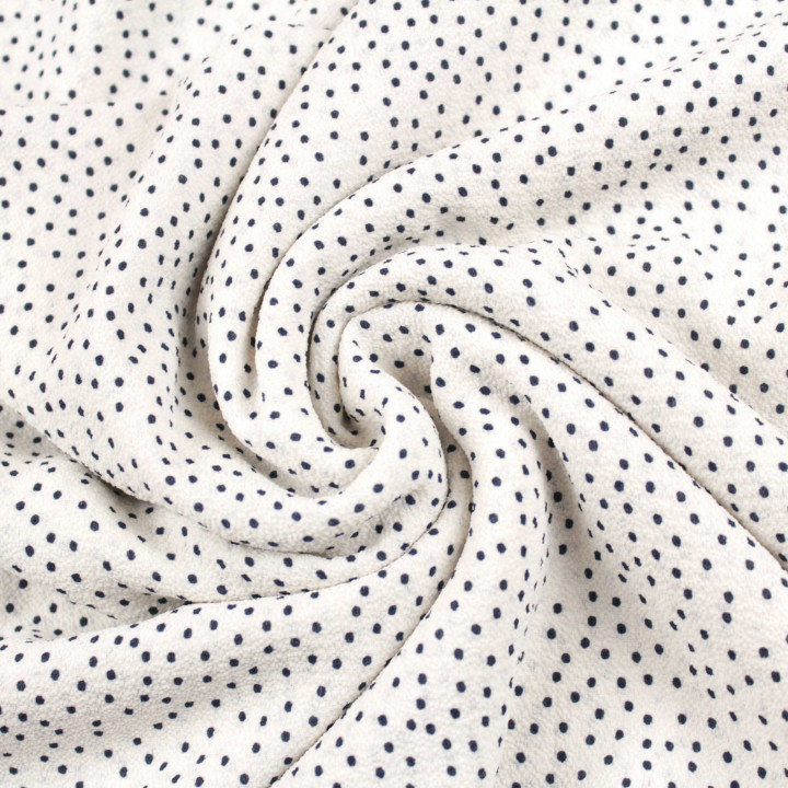 Coupon de tissu crêpe polyester blanc imprimé petits points noirs