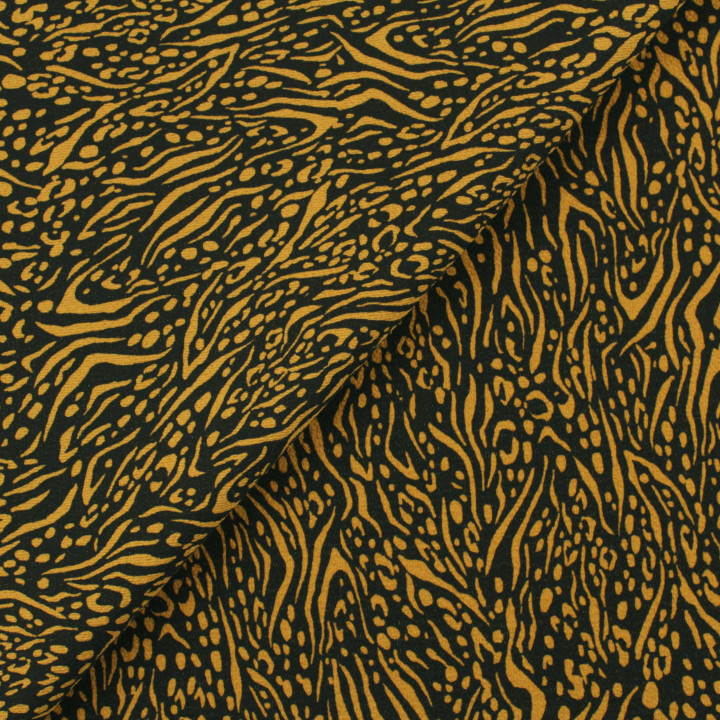 Coupon de tissu satin noir toucher crêpe imprimé motif géométrique doré