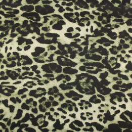 Coupon de tissu satin fluide motif léopard noir sur fond vert