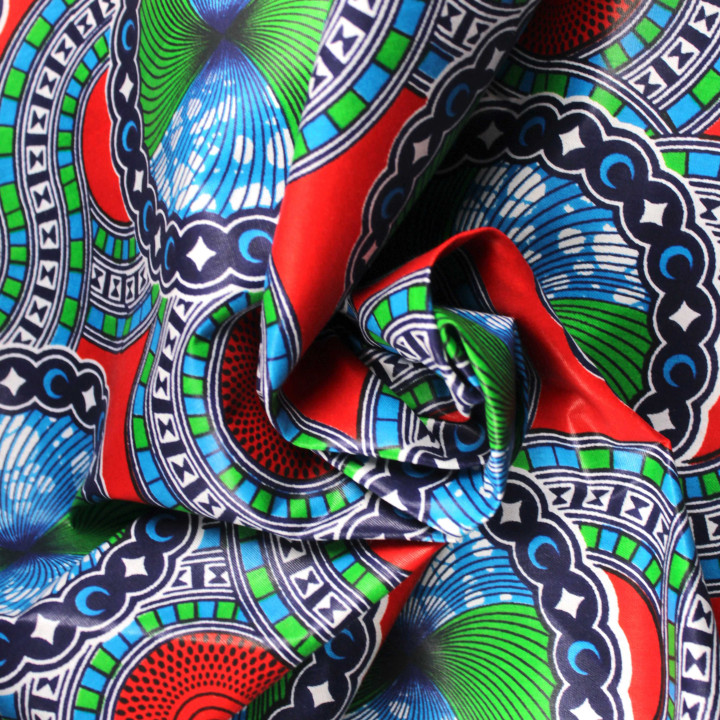 Tissu coton Wax imprimé géométrique vert, bleu, blanc, rouge et noir