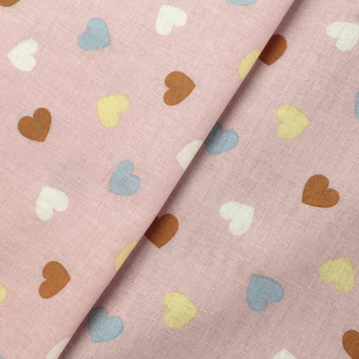 Tissu coton rose imprimé cœurs - Idéal pour habillement et couture au mètre