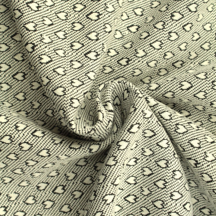 Tissu jersey blanc imprimé cœur géométrique