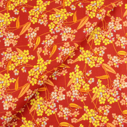 Tissu coton fleuri vintage orange, jaune, bleu et rouge motif floral rétro