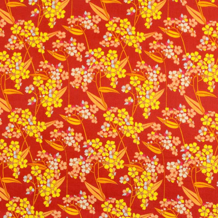 Tissu coton fleuri vintage orange, jaune, bleu et rouge motif floral rétro