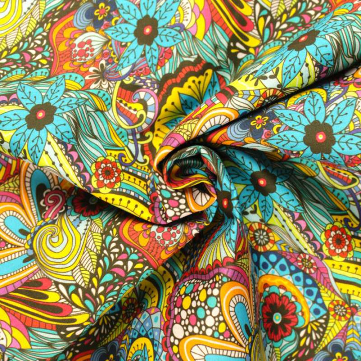 Coupon tissu imprimé floral paisley multicolore – Motif all-over turquoise, jaune et orange esprit Sixties