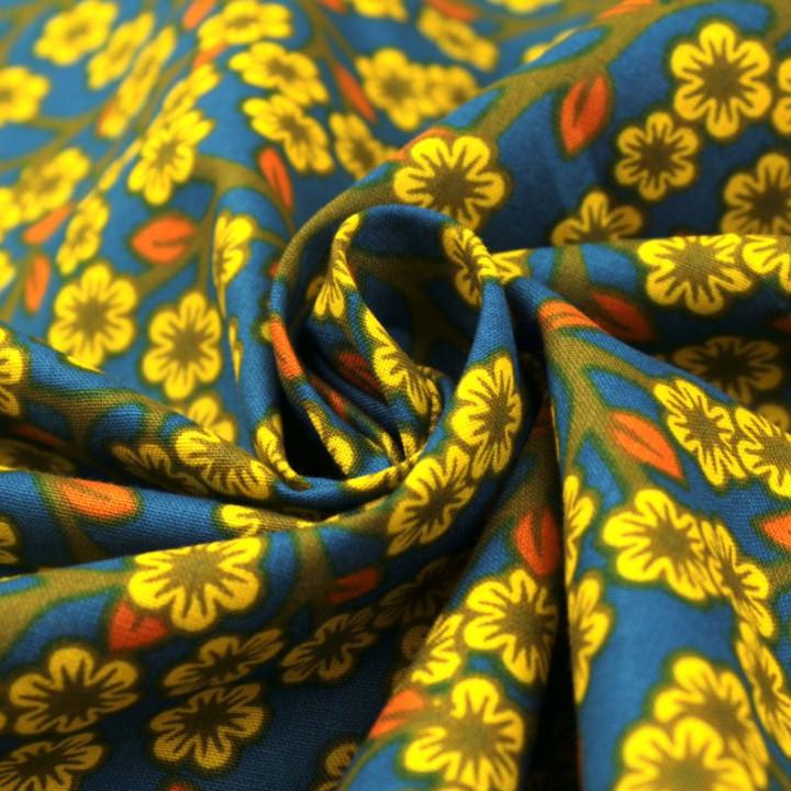 Tissu en Coton Bleu Nuit avec Motifs Floraux Jaunes et Oranges - Élégance et Vitalité