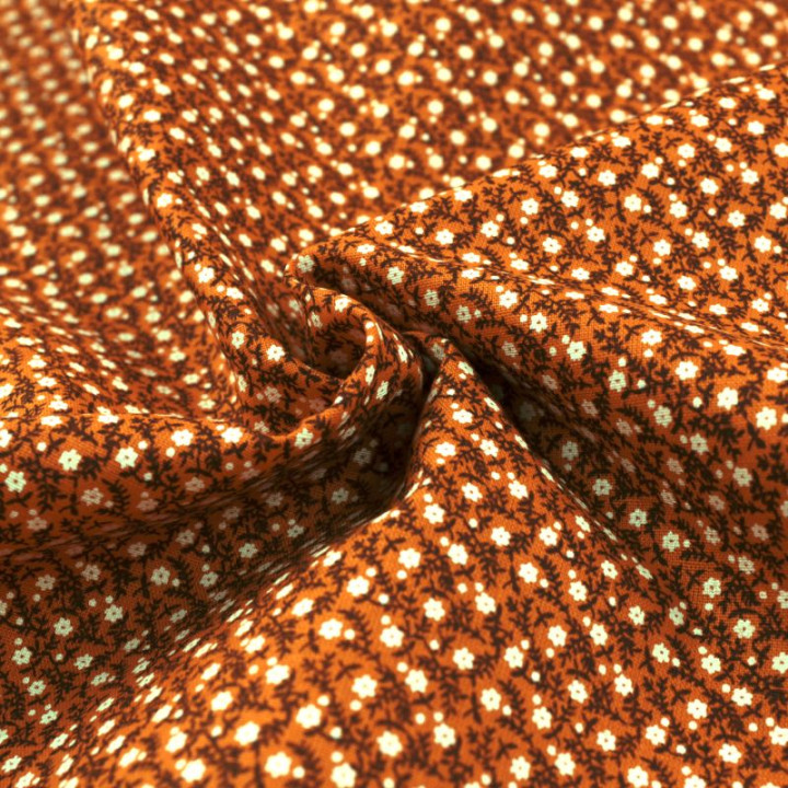 Tissu en coton orange à motifs petites fleurs blanches - Idéal pour créations estivales