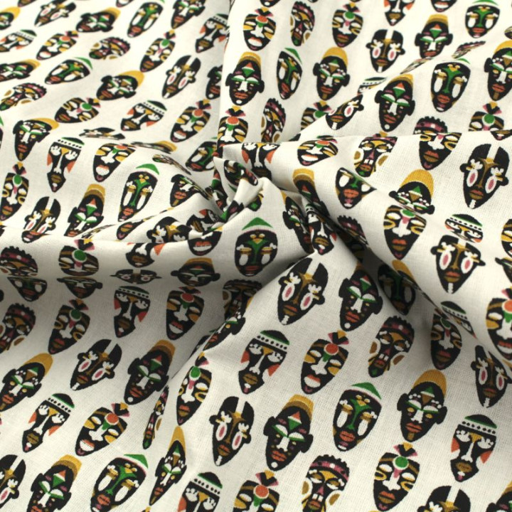 Tissu coton beige clair imprimé masques africains - Parfait pour habillement et couture au mètre