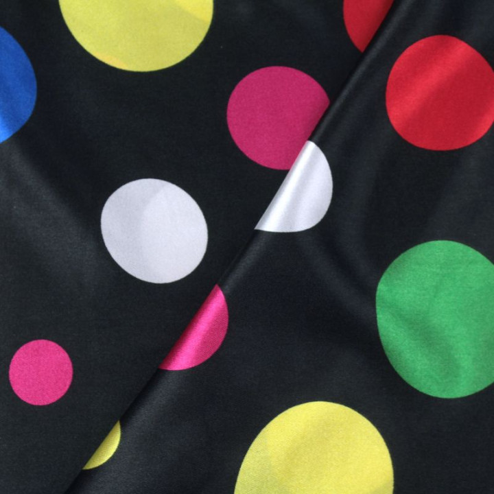 Tissu Satin polyester gros pois multicolores sur fond noir