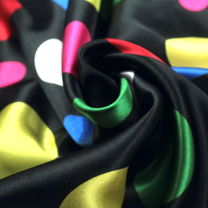 Tissu Satin polyester gros pois multicolores sur fond noir