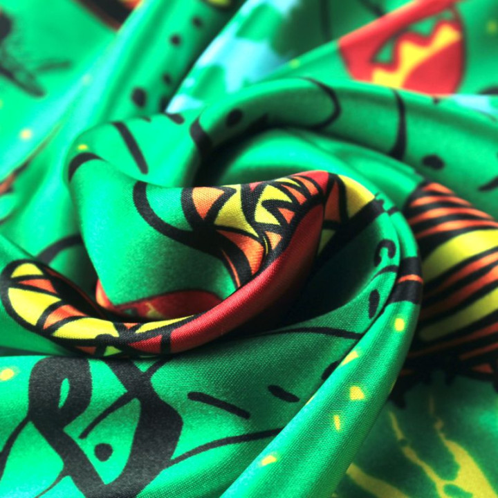 Tissu satin polyester mexicains sur fond vert