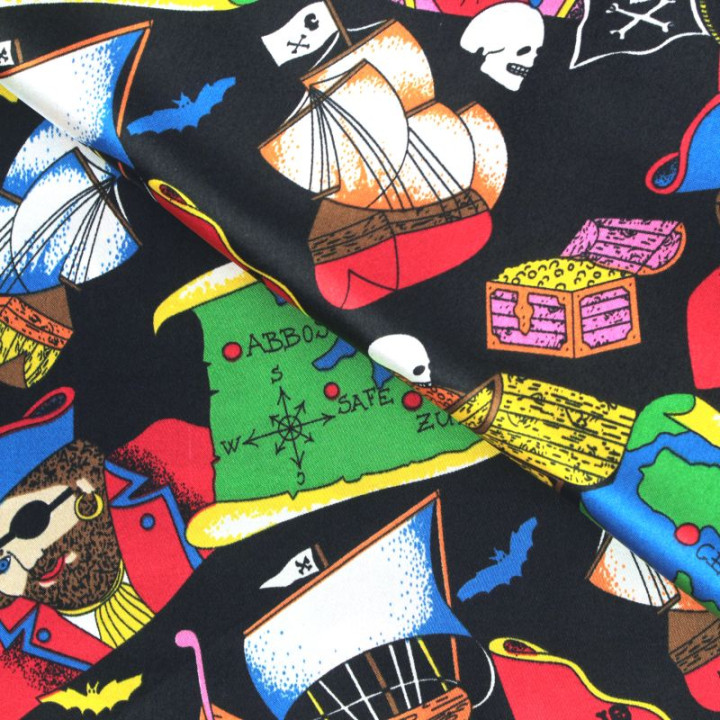 Tissu Satin polyester pirates sur fond noir