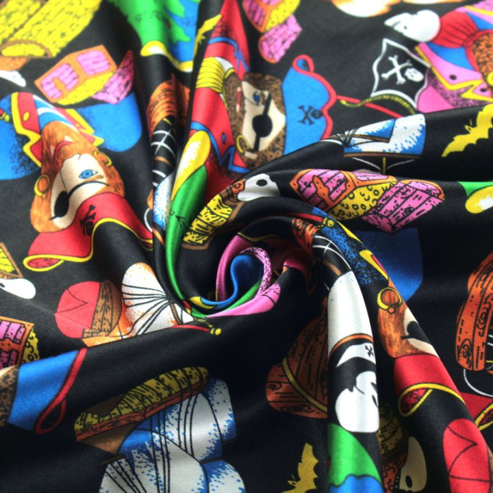 Tissu Satin polyester pirates sur fond noir